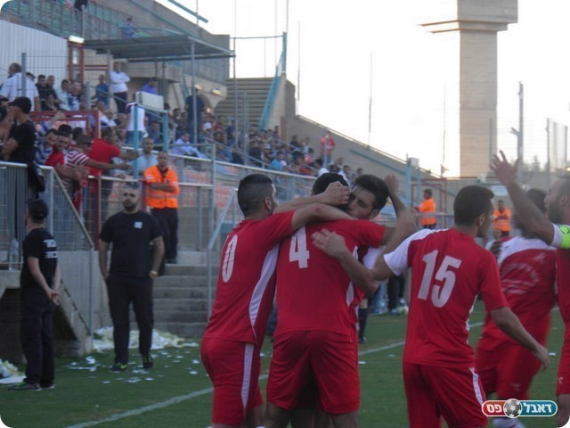 שחקני איכסל חוגגים (מובאדה פרחאת)